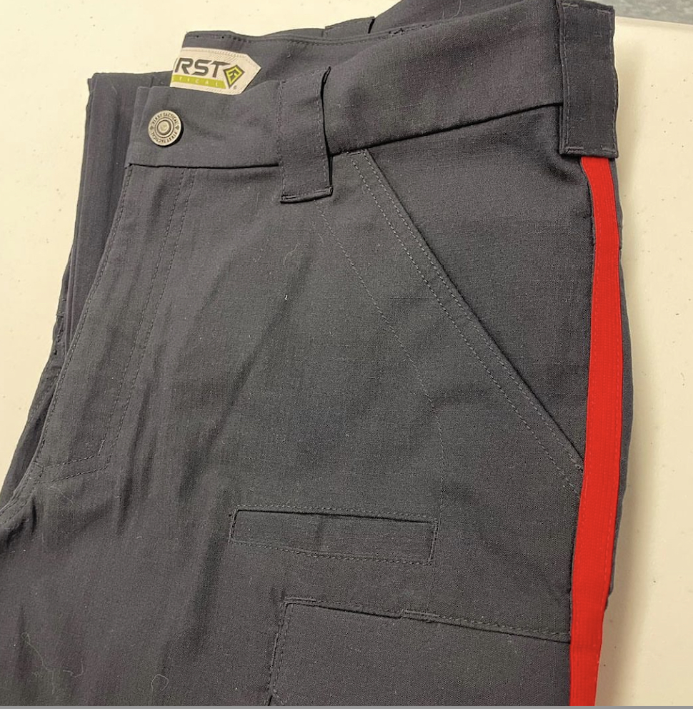 Navy pants with red 2025 stripe